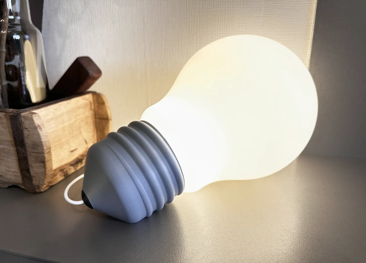 Oversized light bulb novelty lamp close up showing 3D printed base